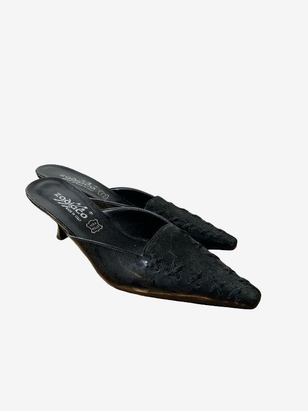 A pair of black pointed-toe mule heels with a textured crocodile-embossed finish, shown on a light gray background.