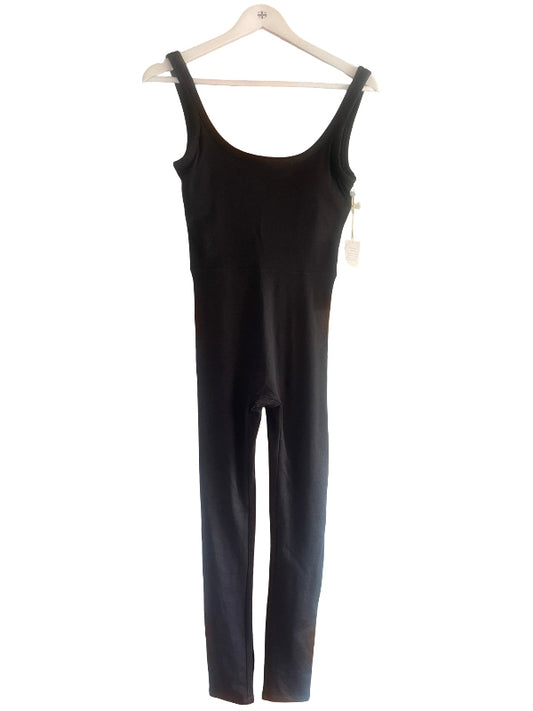 A black sleeveless jumpsuit hanging on a white wooden hanger against a plain white background.