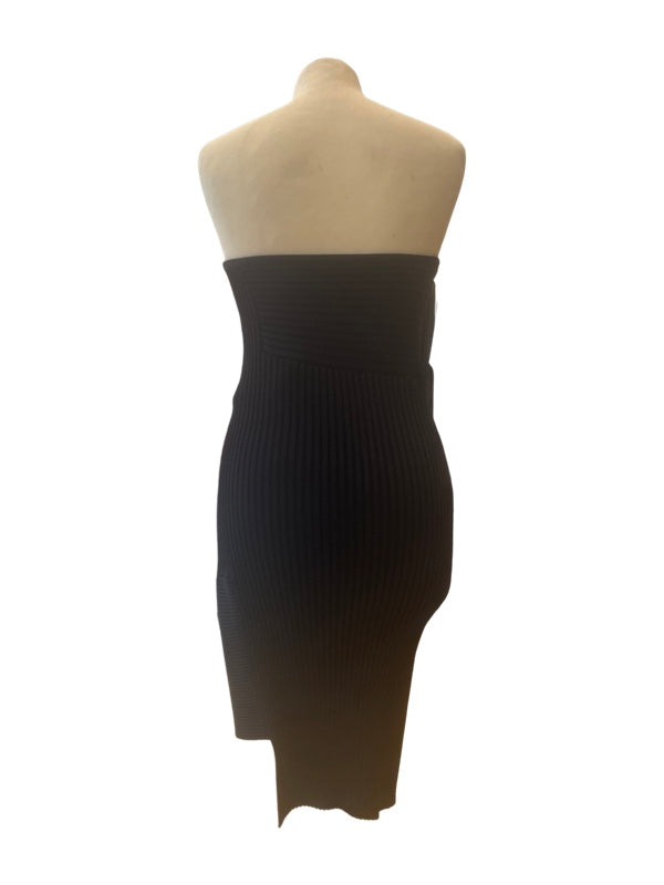 Back of black tight strapless dress with a symmetric hemline