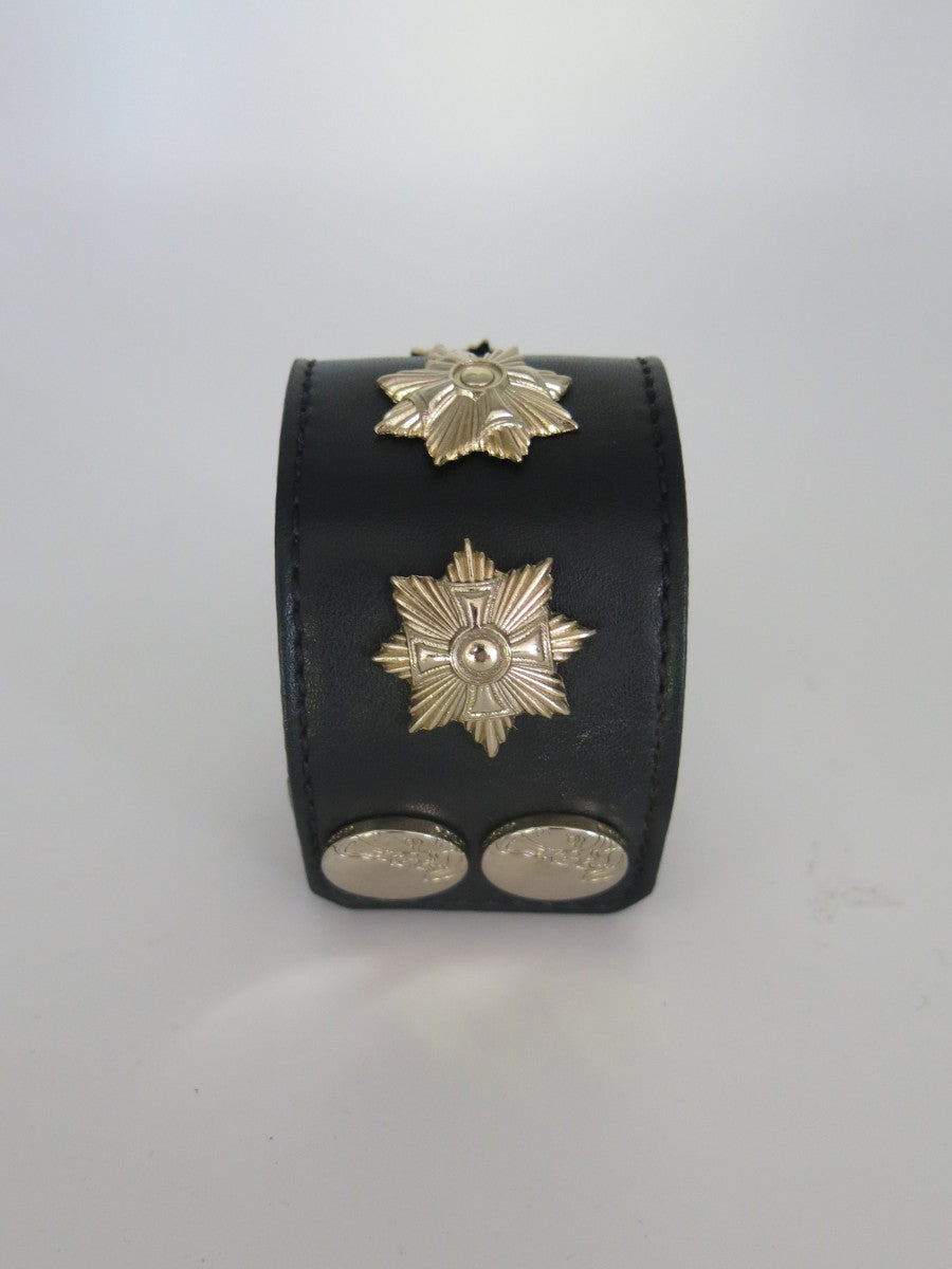 Black leather ladies cuff with gold hardware